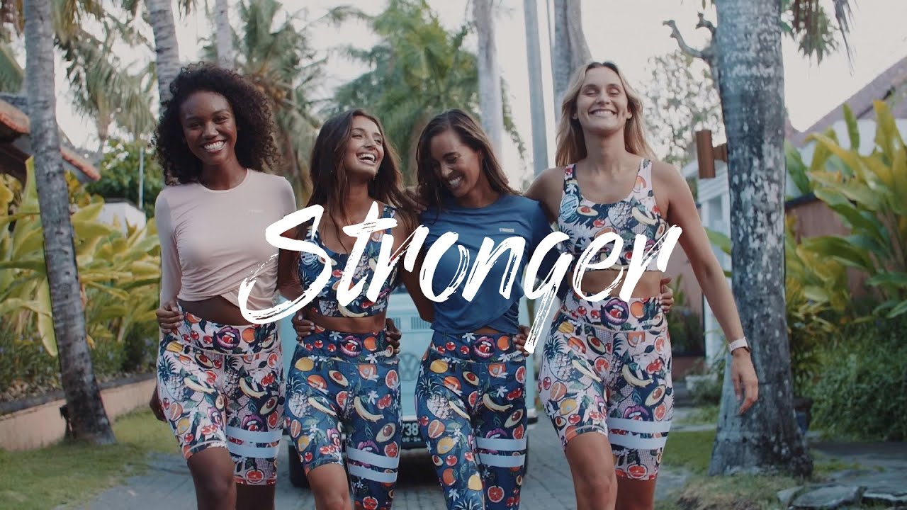 Stronger Activewear - Bali Friendship Campaign Four women laughing together in Stronger fruit-print activewear on a tropical Bali street for brand campaign by WeDo Creative Films